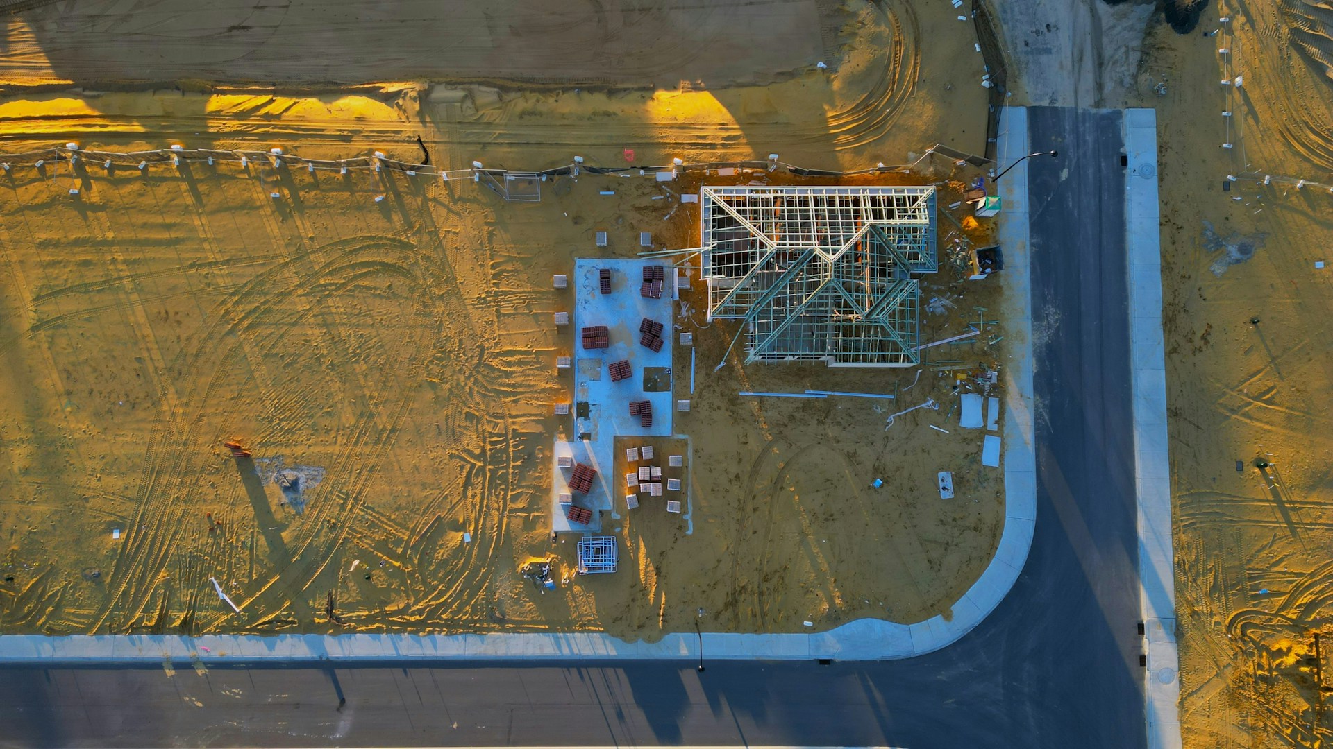 Aerial view of a Central Alberta development site under construction